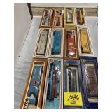 GROUP OF BOXED TRAIN CARS OF ALL KINDS