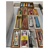 GROUP OF BOXED TRAIN CARS OF ALL KINDS