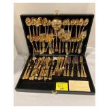 SET OF APPEARS UNUSED GOLD-TONE CHINA FLATWARE