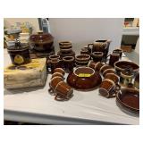 LARGE GROUP OF BROWN DRIP STONEWARE