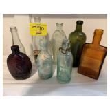 GROUP OF ANTIQUE GLASS BOTTLES OF ALL KINDS