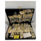 GOLD-TONE FLATWARE SET IN CASE