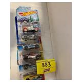 ROW OF HOT WHEELS CARS ON CARDS