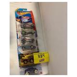 ROW OF HOT WHEELS CARS ON CARDS