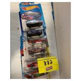 ROW OF HOT WHEELS CARS ON CARDS