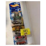 ROW OF HOT WHEELS CARS ON CARDS
