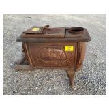 ANTIQUE CAST IRON STOVE PIECE