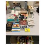 CLEANING SUPPLIES UNDER TABLE, VHS TAPES, OFFICE