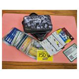 CJ STROUD TIN FULL OF POKEMON AND FOOTBALL CARDS.