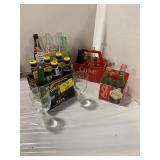 4 CARRIERS OF GLASS SODA BOTTLES OF ALL KINDS