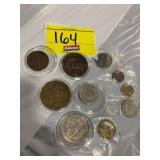 GROUP OF FOREIGN COINS & TOKENS OF ALL KINDS