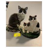 2 CAT CAST IRON DOOR STOPS