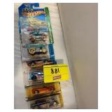 ROW OF HOT WHEELS CARS ON CARDS