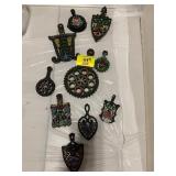 GROUP OF METAL PAINTED TRIVETS