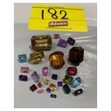 GROUP OF EMERALD & PRINCESS CUT FACETED GEMSTONES