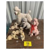 GROUP OF POODLE FIGURINES