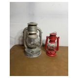 Lot of 2 oil lanterns. Red one is Winged Wheel and