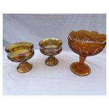 Lot of 3 carnival glass pedestal pieces.