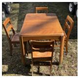 Wooden dining table with 4 chairs