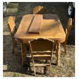 Wooden table with 4 chairs. Table top and chairs