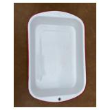 Red and white graniteware baking pan