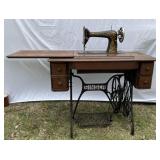 Singer sewing machine table, includes sewing machi