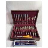Silver Plated Silverware set that serves 8. Includ