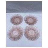 Set of 4 pink depression glass saucers. Two of the