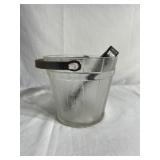 Old glass ice bucket with metal tongs