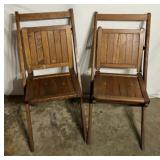 2 wooden folding chairs