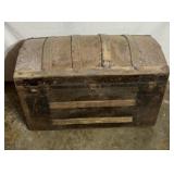 Old wooden and metal trunk. Hinges are broken.