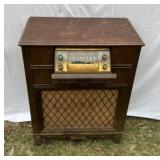 Cabinet with Silvertone Radio mounted in it.