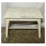 Destressed white wooden bench