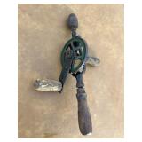 Old hand drill with wooden handles. Does not inclu