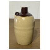Mini crock jug. Has chip on spout.