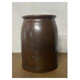 Brown stoneware crock.