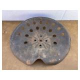 Old metal tractor seat