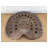 Old metal tractor seat