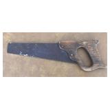 Small old hand saw