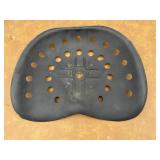 Old metal tractor seat