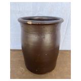 3 Gallon brown crock. Crock has large chips along