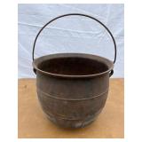 Cast iron footed kettle.