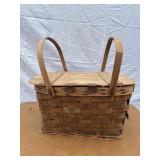 Old wooden picnic basket with hinged lid