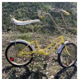 Yellow Schwinn Sting Ray "Fair Lady" Has a flora