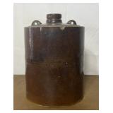 Gallon crock jug. Missing handle. Has multiple chi