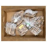Flat of wooden clothes pins