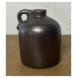 Small brown crock jug