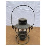 Old railroad lantern marked The Adams & Westlake C