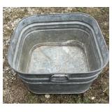 Galvanized wash tub. Marked 62.