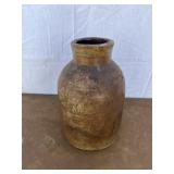 Stoneware jar. Has large crack along bottom and up